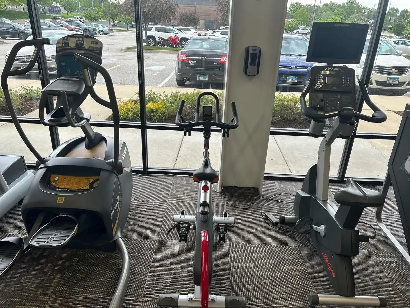 Octane trainer, spin bike, and Life Cycle bikes at E’ville Fitness