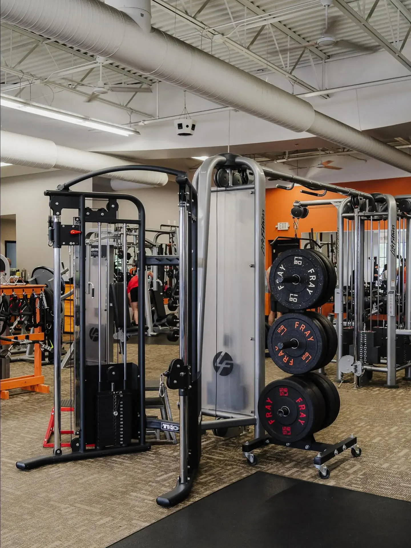 Cable machines and plate stacks at E’ville Fitness