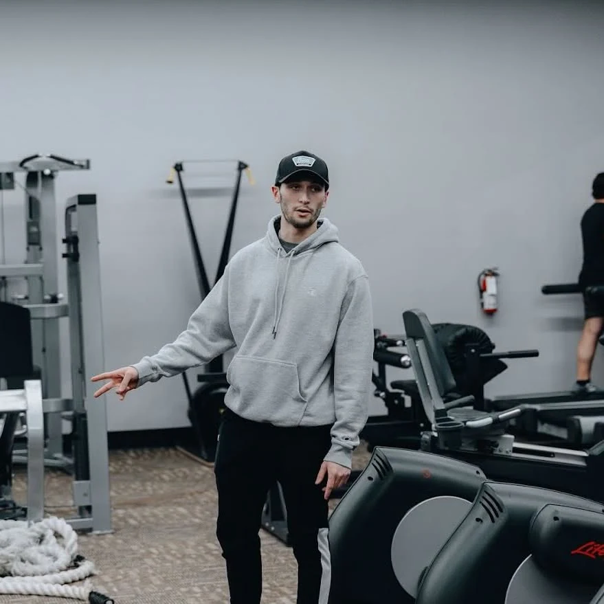 Coach on the floor at E’ville Fitness